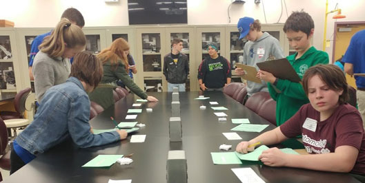 4-H students participate in the insect ID competition in the first annual Insectathon. Students participated in insect collection, art, and skill contests. 